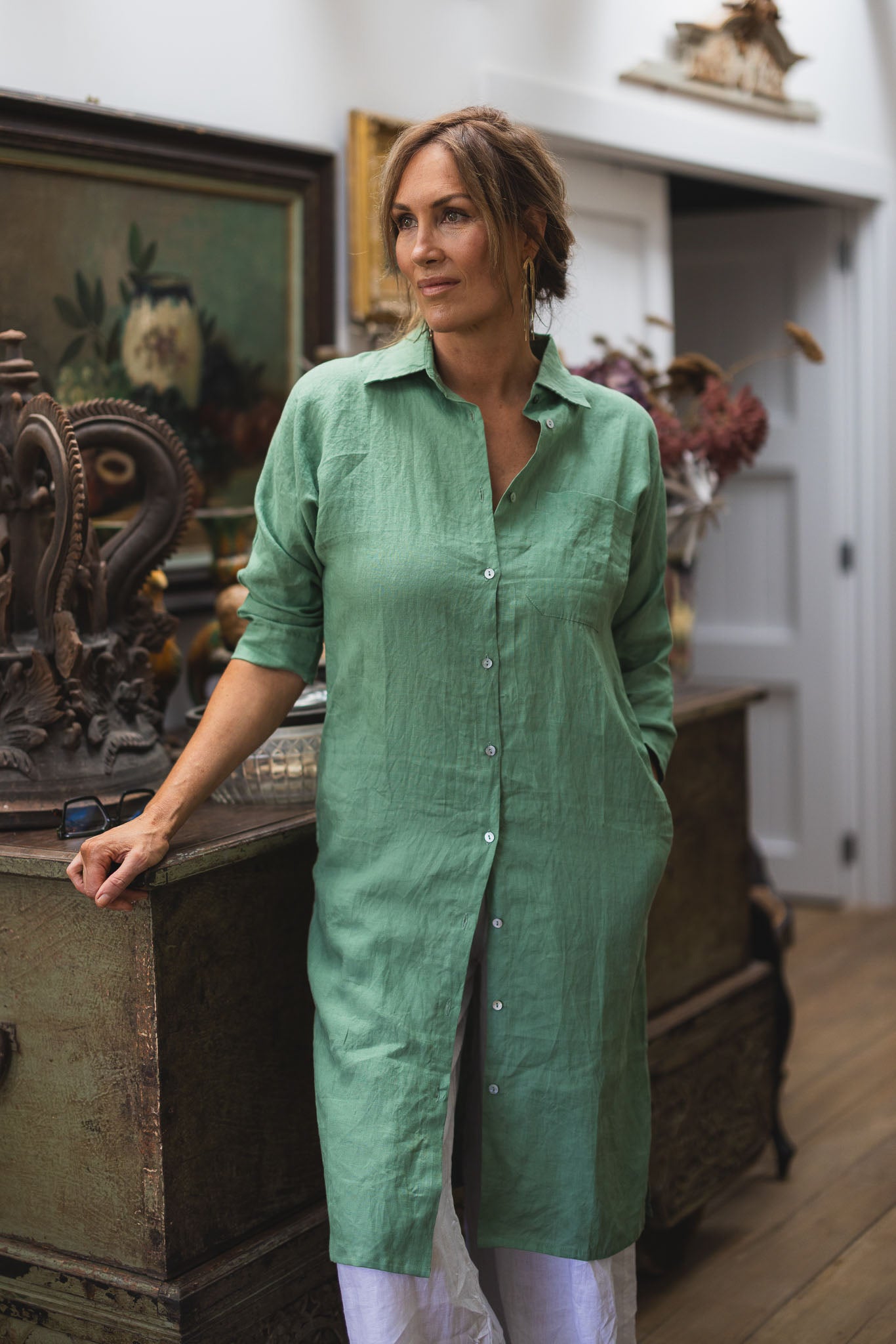 Get Shirty 25 linen green shirt over pants on model in home