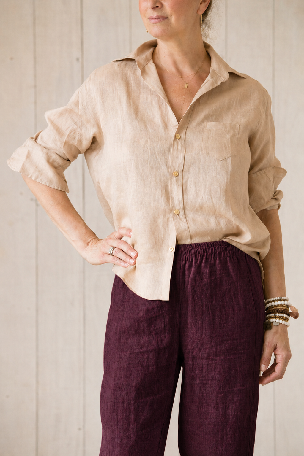 straight legged linen pant with self stripe, side pockets in colour fig