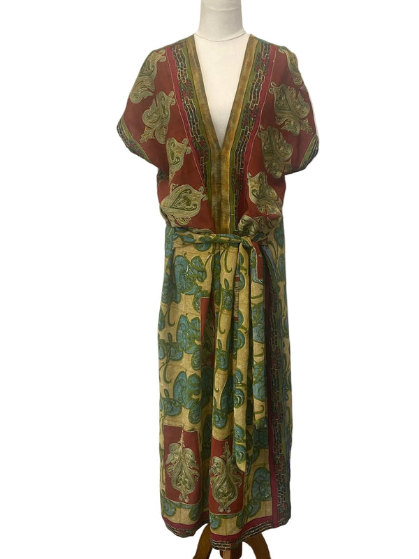 Mamamia Dress: Colorful patterned dress on a mannequin against a white background