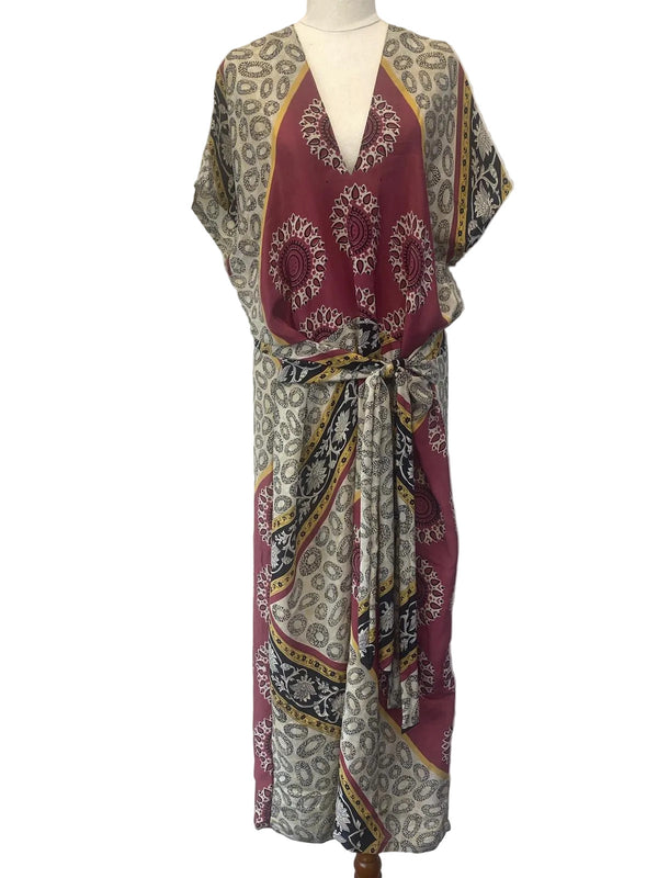 Mamamia Dress: Colorful patterned dress on a mannequin against a white background