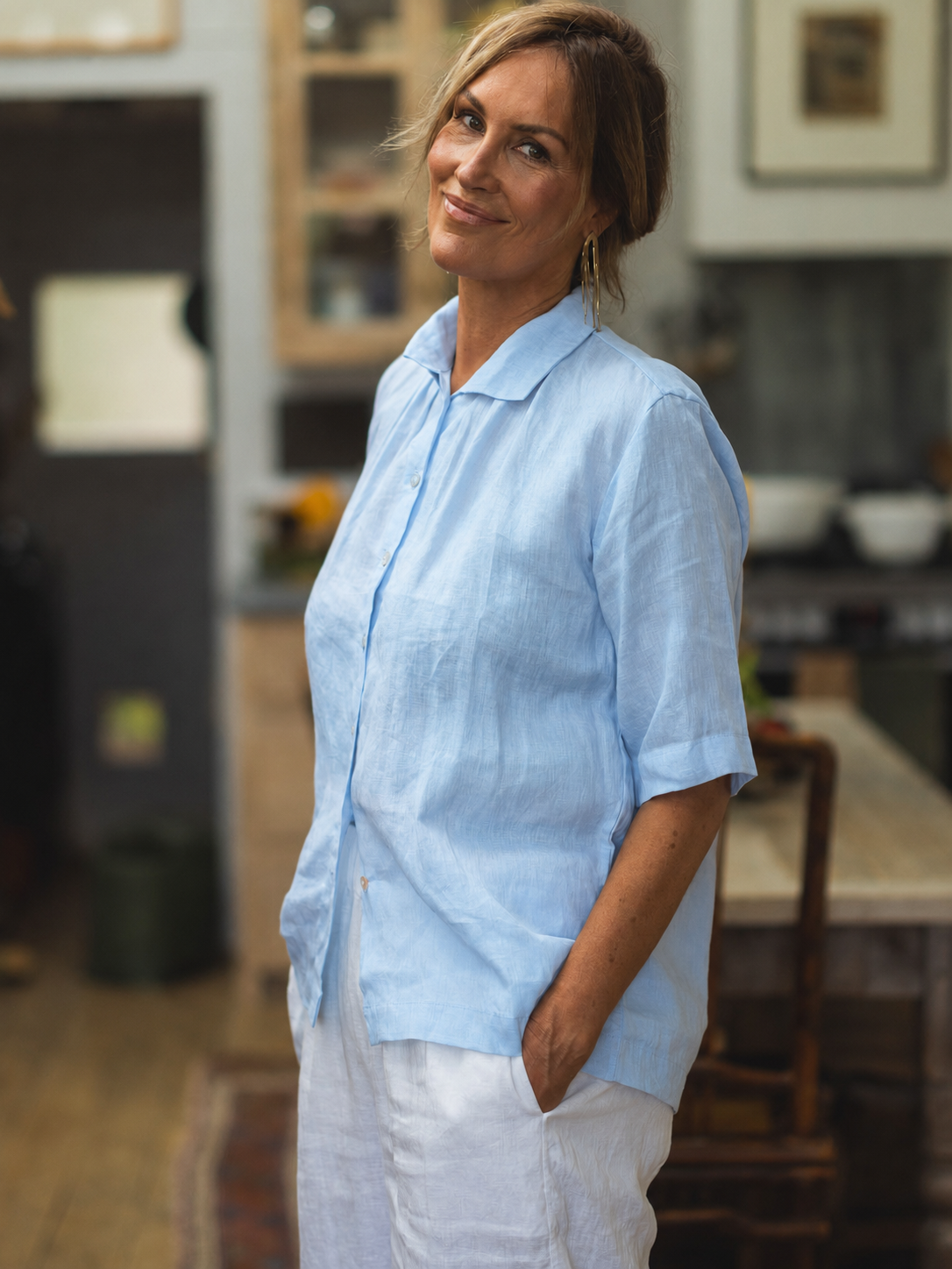 Tiny Tuck linen shirti n powder blue neck and back detail.