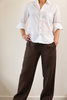 White shirt with chocolate brown linen pants